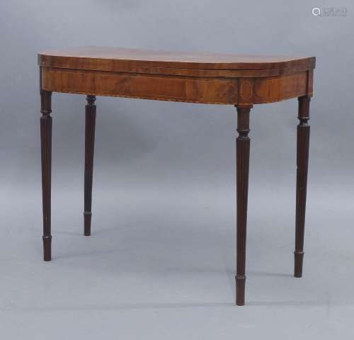 A George III mahogany card table, boxwood inlaid, raised on ...