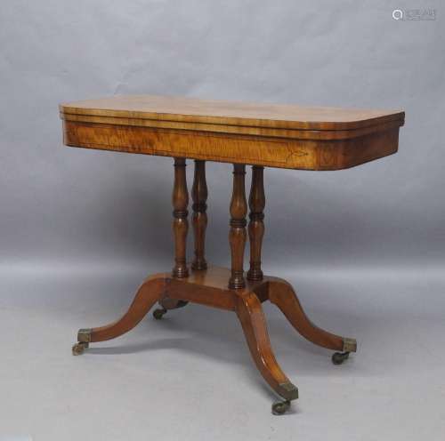 A Regency mahogany card table, ebony strung, the rectangular...