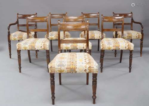 A set of eight Regency mahogany dining chairs, recently upho...