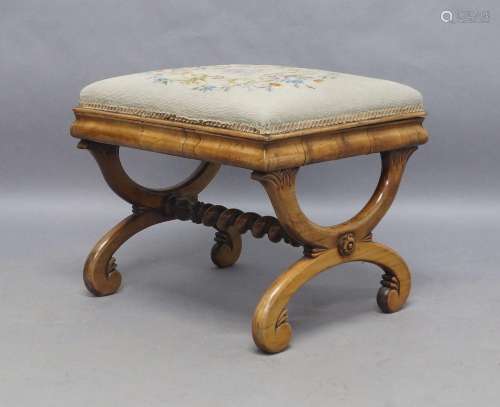 A William IV rosewood ottoman stool, with floral needle work...