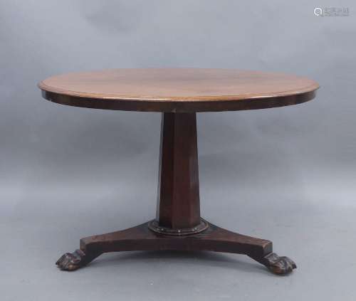 A William IV mahogany tilt top table, raised on triform base...
