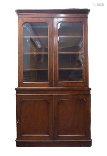 A Victorian mahogany bookcase, with two glazed doors above t...