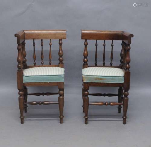 A pair of Victorian mahogany child’s corner chairs, with spi...