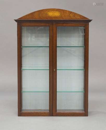 An Edwardian glazed mahogany wall cabinet, 70cm high, 46cm w...