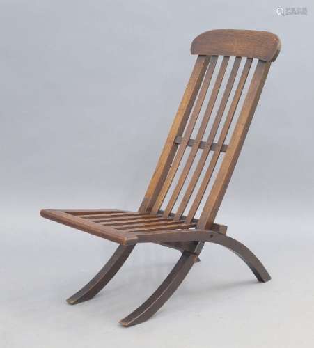 A folding oak campaign chair, early 20th century A folding o...