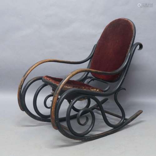 A Thonet style black lacquered bentwood rocking chair, early...