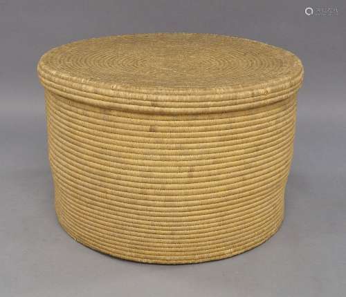 A large Raffia basket, 48cm high, 76cm diameterA large Raffi...
