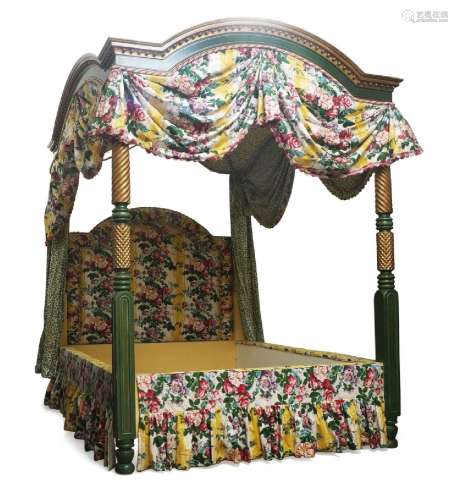 A modern green and gilt painted four poster bed, with floral...