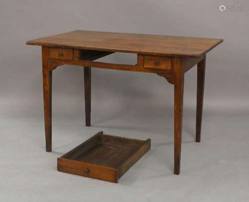 A French cherry wood table, late 19th century, long drawer f...