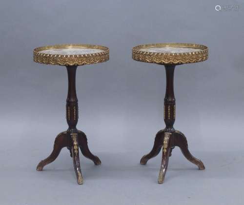 A pair of Louis XV style mahogany circular side tables, with...