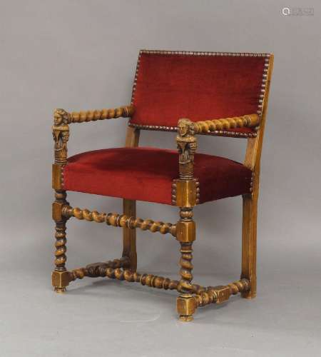 A Continental walnut armchair, early 20th century, with carv...