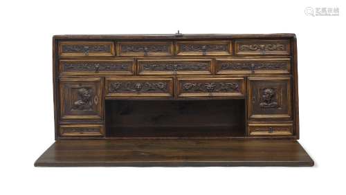 A Spanish walnut Bargueño, 17th century and later, the later...