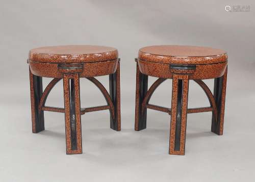 A pair of Burmese style red and black lacquered storage boxe...