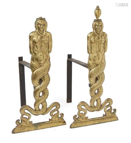 A pair of polished brass figural andirons, 19th century, eac...