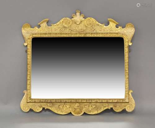 A George I style giltwood over mantle mirror, early 20th cen...