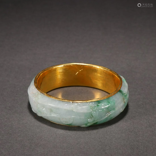 CHINESE GOLD-MOUNTED JADEITE BANGLE WITH CARVED 'BAT AN...