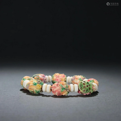 CHINESE POLYCHROMED RARE MATERIAL BEADED BRACELET WITH CARVE...