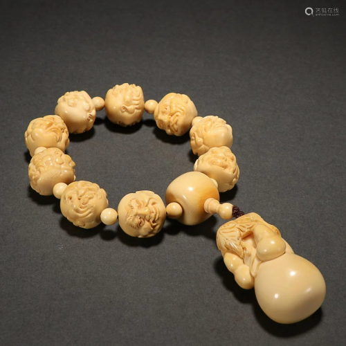 CHINESE RARE MATERIAL BEADED BRACELET WITH CARVED 'ARHA...
