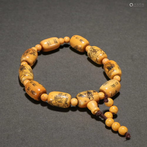CHINESE RARE MATERIAL BEADED BRACELET WITH CARVED 'EIGH...