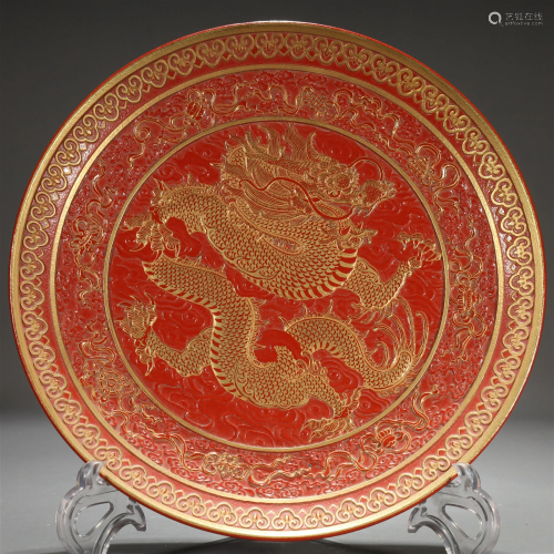 A Red-Ground Gilded Incised 'Dragon' Dish