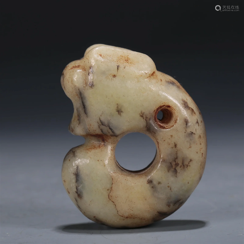 A Hongshan Culture C-Shaped Jade 'Dragon' Pendant.