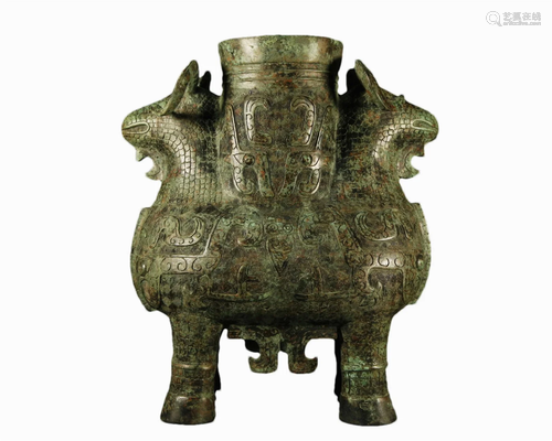 A Ancient Bronze 'Two Rams' Zun-Form Vase With Ins...