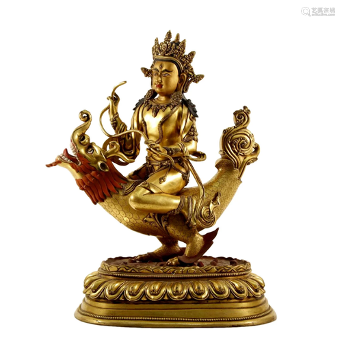 A Gilt Bronze Figure Of Avalokitesvara