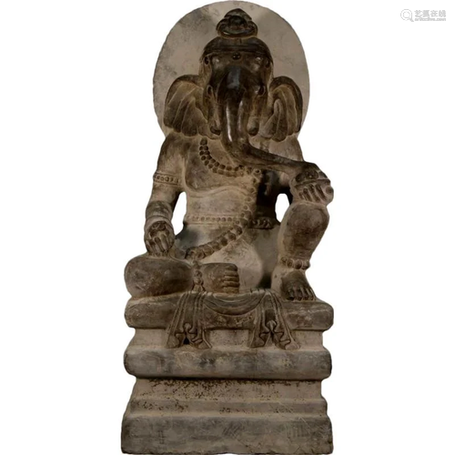 A Stone Figure Of Kubera With An Elephant's Trunk