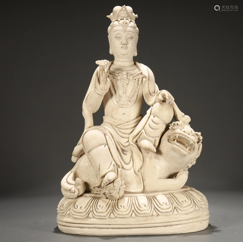 A Blanc-De-Chine Figure Of Buddha Seated On A Lion