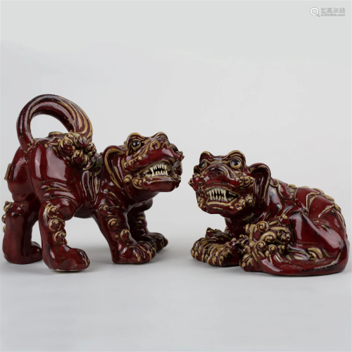 A pair of Shiwan kiln red-glazed lucky dogs with mark, Repub...