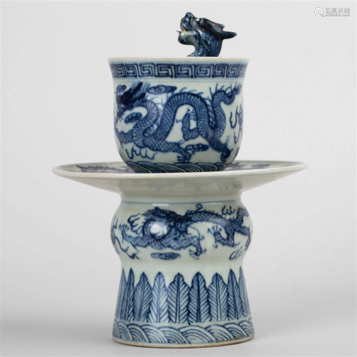 Blue and white dragon head justice cup, made in the Daqing K...