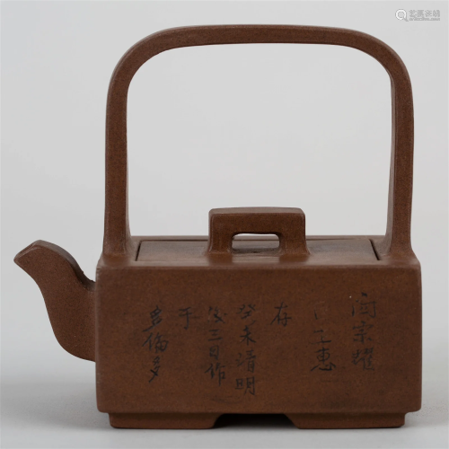 Bule pot with handle made by Zhou Shengxi