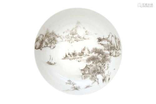 A CHINESE EN-GRISAILLE 'LANDSCAPE' SAUCER DISH. Delicately p...