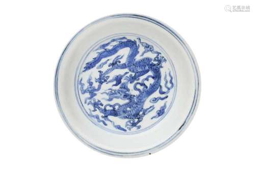 A CHINESE BLUE AND WHITE 'DRAGON' DISH. With deep S-shaped s...