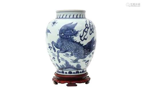 A CHINESE BLUE AND WHITE 'MYTHICAL BEASTS' JAR. The robustly...