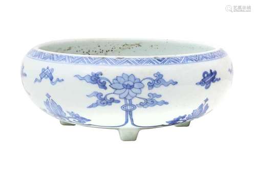 A CHINESE BLUE AND WHITE 'LOTUS' INCENSE BURNER. The compres...