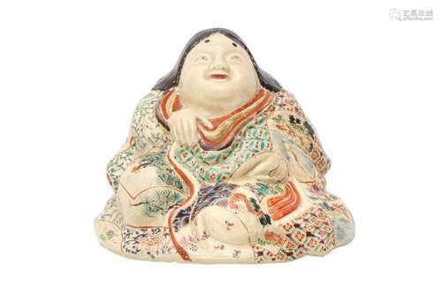 A JAPANESE SATSUMA FIGURE OF OKAME. Meiji / Showa period. Sq...