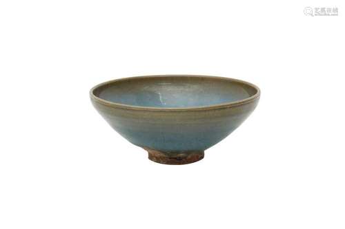 A CHINESE JUN-TYPE BOWL. The flared body supported on a narr...