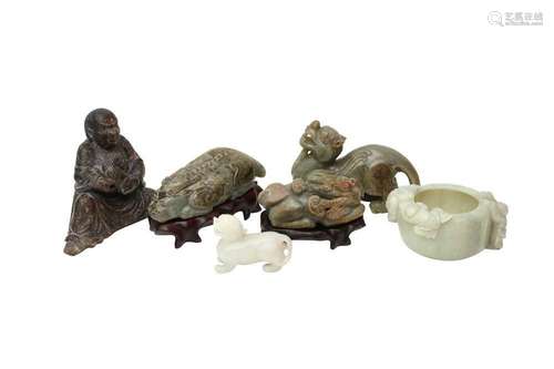 FIVE CHINESE JADE CARVINGS AND A SOAPSTONE FIGURE. Comprisin...