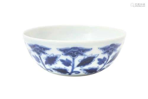 A CHINESE BLUE AND WHITE 'BLOSSOMS' BOWL. With a flared roun...