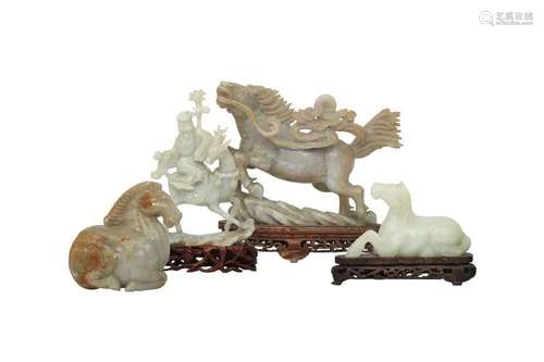 FOUR CHINESE JADE AND JADEITE CARVINGS. Comprising three jad...