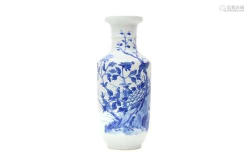 A CHINESE BLUE AND WHITE 'BIRD AND PEONIES' ROULEAU VASE. Qi...