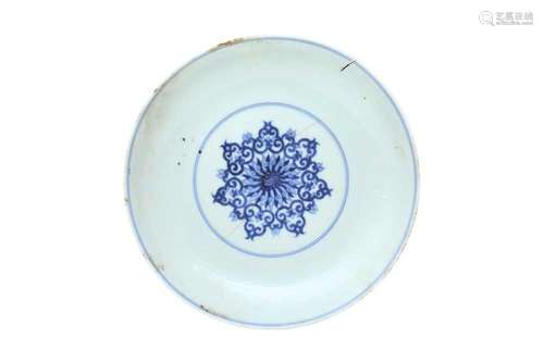 A CHINESE BLUE AND WHITE 'LOTUS SCROLL' DISH. With a central...