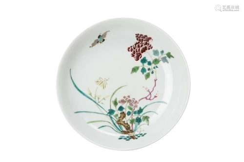 A CHINESE FAMILLE ROSE 'BLOSSOMS' DISH. The face painted wit...