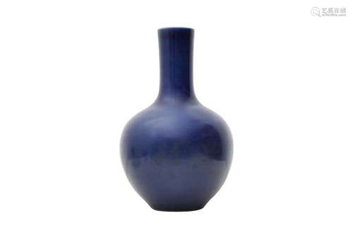 A CHINESE MONOCHROME BLUE-GLAZED VASE