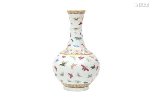 A CHINESE FAMILLE ROSE 'BUTTERFLIES' VASE. The globular body...