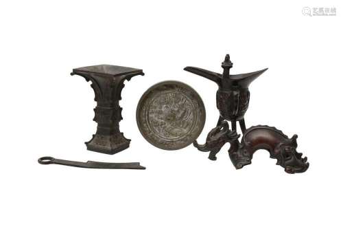 A SMALL GROUP OF CHINESE BRONZES. Comprising: a ritual tripo...