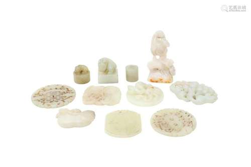 A COLLECTION OF CHINESE WHITE JADE CARVINGS. Including a pho...