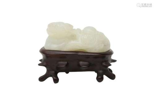 A CHINESE WHITE JADE 'BUFFALO AND BOY' GROUP