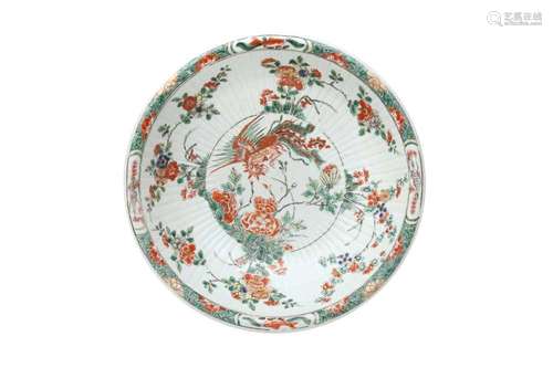 A CHINESE FAMILLE VERTE RIBBED 'PHOENIX AND PEONIES' BOWL